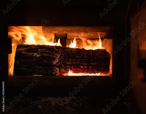 logs in stove