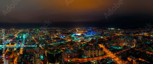 drone view of night city in lights and neon lighting. Yekaterinburg, Ural, Russia.