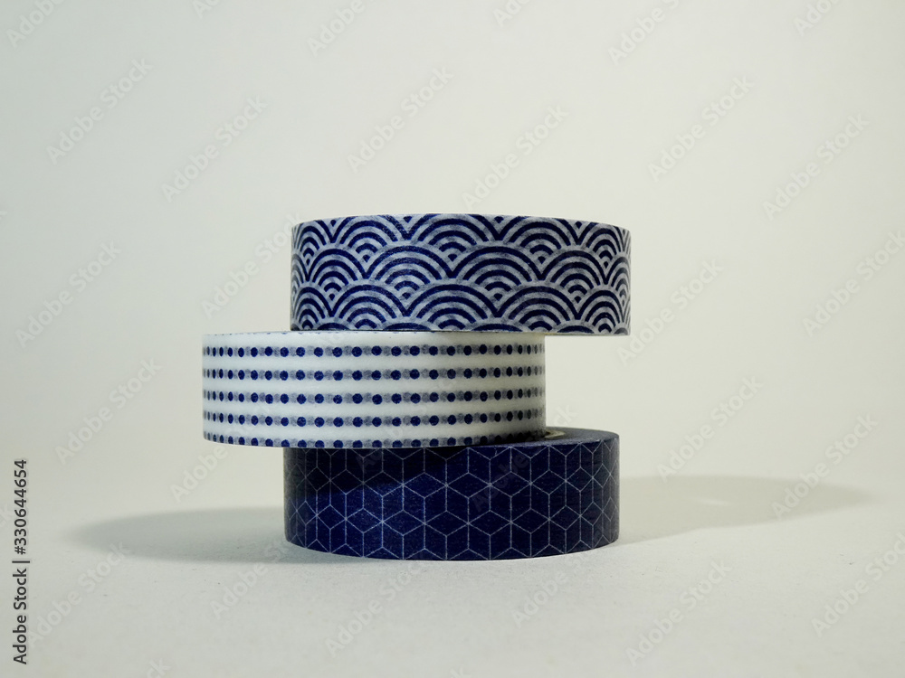 Three washi tapes: White blue polkadot, white blue waves pattern and white blue geometric pattern Three washi tapes: White blue polkadot, white blue waves pattern and white blue geometric pattern