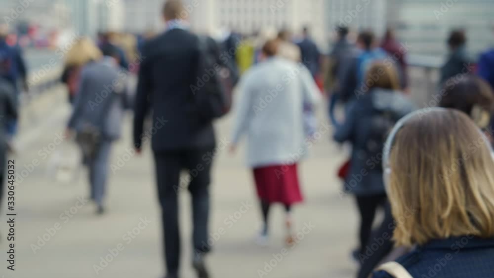 Crowd of pedestrian commuters in London on cool morning in slow motion. Clip 45a Crowd of pedestrian commuters in London on cool morning in slow motion. Clip 45a