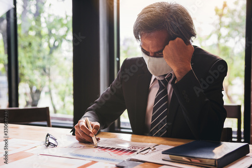 Fotografie Bad investment or economic crisis from virus concept