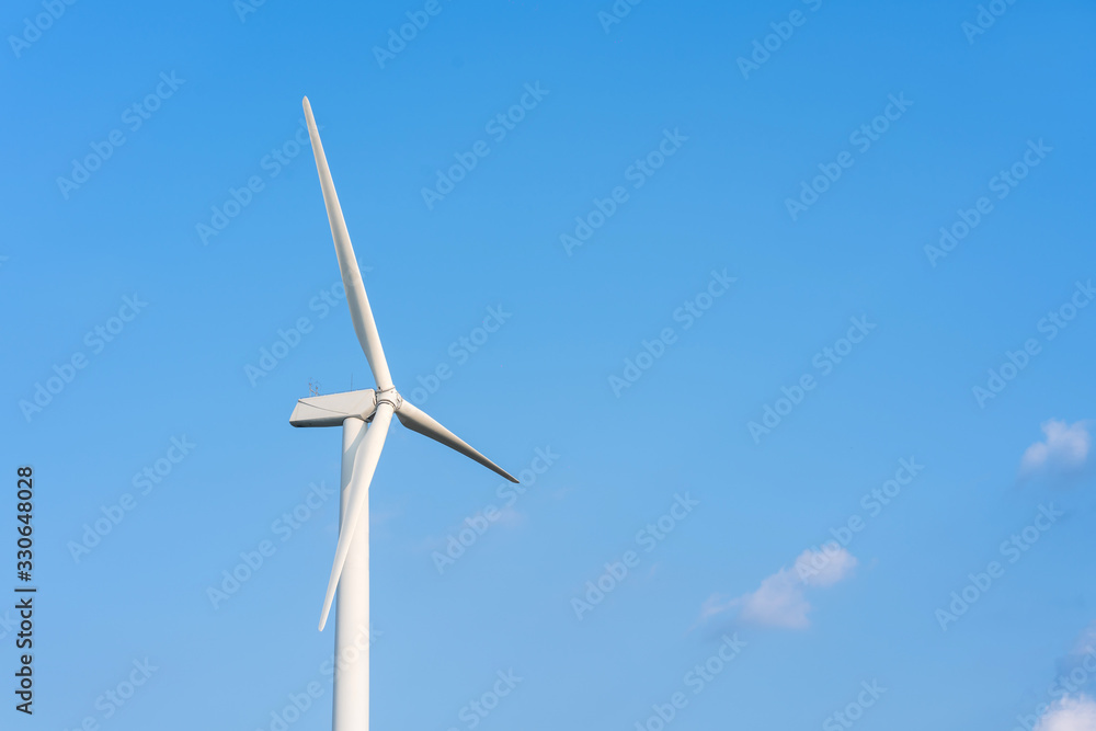 Wind turbine renewable energy source summer with blue sky Wind turbine renewable energy source summer with blue sky