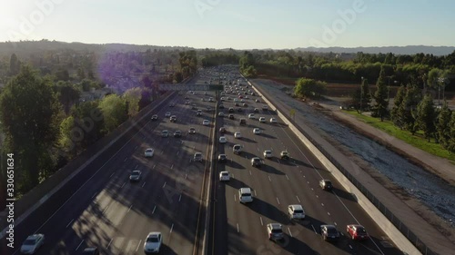 Sitting directly above the San Fernando Valley freeway during rush hour photo