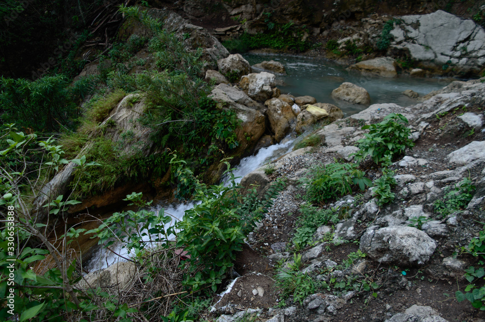 Small waterfall under the famous neer garh Waterfall, Rishikesh, Uttarakhand India. Small waterfall under the famous neer garh Waterfall, Rishikesh, Uttarakhand India.