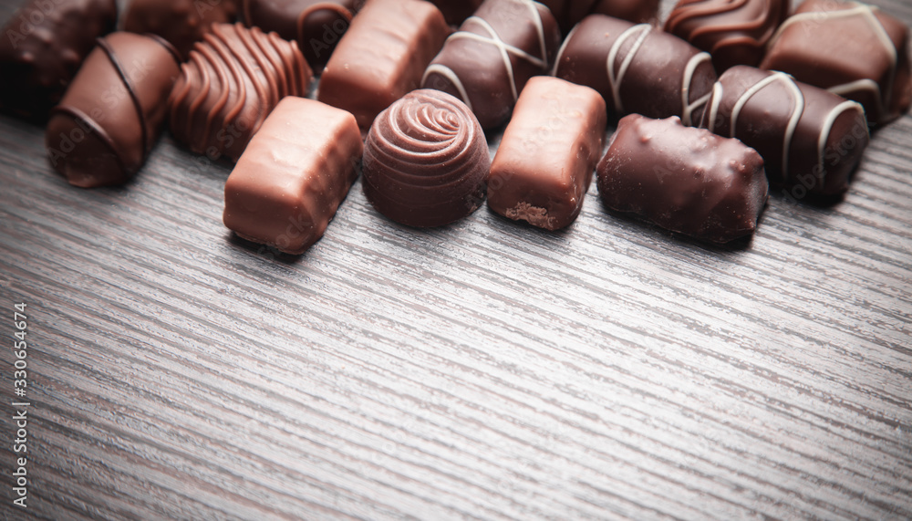 Chocolate candies. Sweet food. Background Chocolate candies. Sweet food. Background