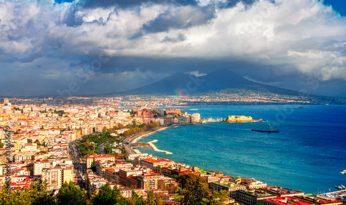 Fototapeta Naklejka Na Ścianę i Meble -  Panoramic scenic view of Naples after rain, Campania, Italy. Part of the rainbow is visible.