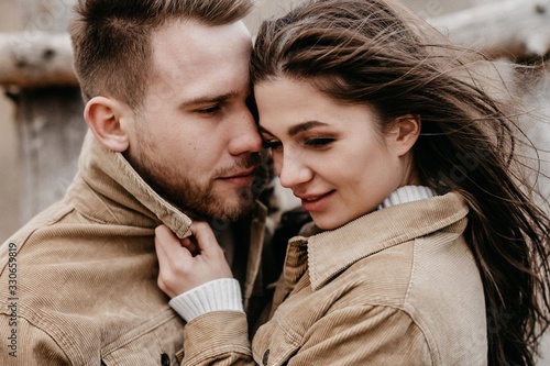 Love story of Oleg and Anastasia. Stylish photo shoot in the forest in cloudy weather. photo