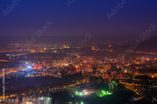 Night view of the city under the mountain