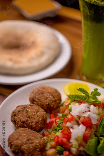 falafel plate with israeli salad and pita bread middle east food vegan