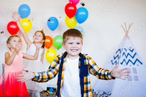 Children celebrate a birthday.