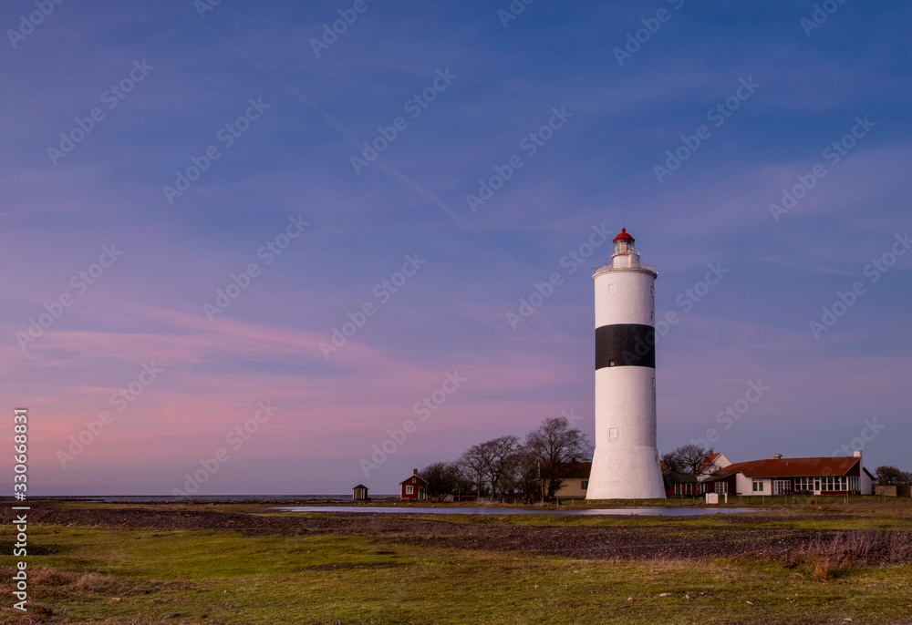 lighthouse at sunset on the Swedish island Öland on the south east cost