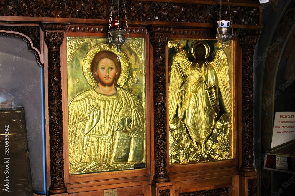 Icon of Jesus Christ handcrafted and covered with gold inside a Christian orthodox church in Athens, Greece