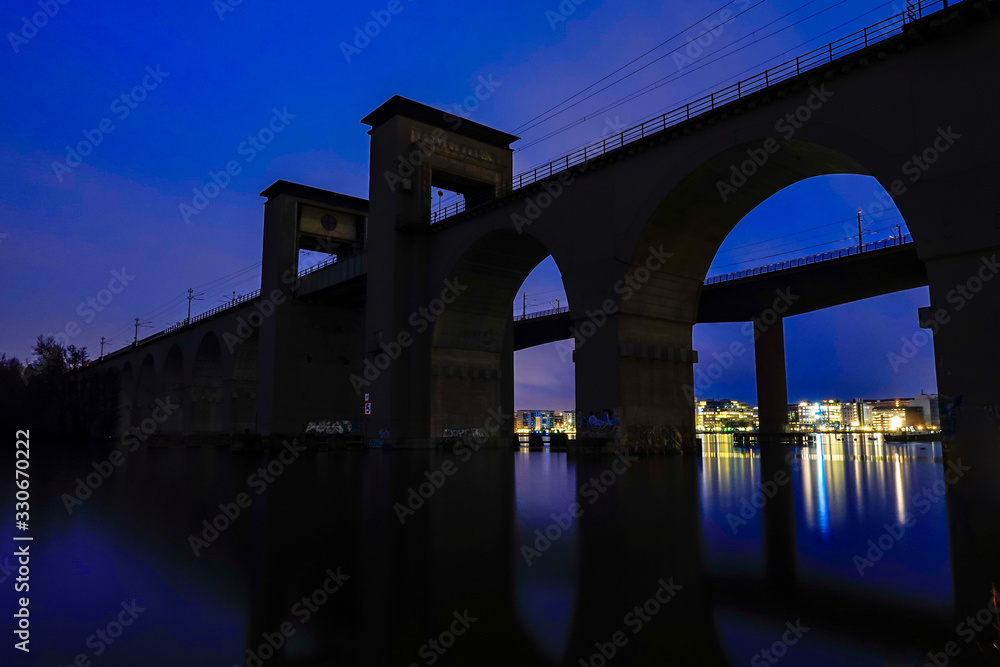 Stockholm, Sweden The neighborhood of Liljeholmskajen at night and the Arsta bridge. Stockholm, Sweden The neighborhood of Liljeholmskajen at night and the Arsta bridge.