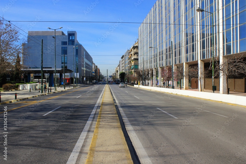 Fototapeta premium Athens, Greece, March 14 2020 - Empty Suggrou Avenue, one of the most crowded streets of Athens due to Coronavirus quarantine measures.