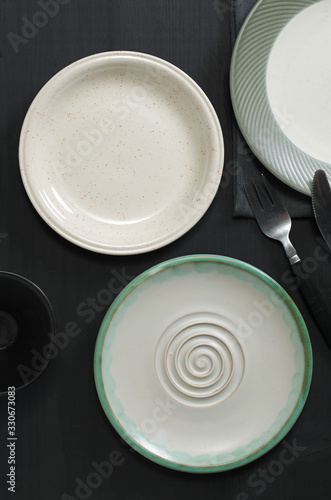 Various plates on table