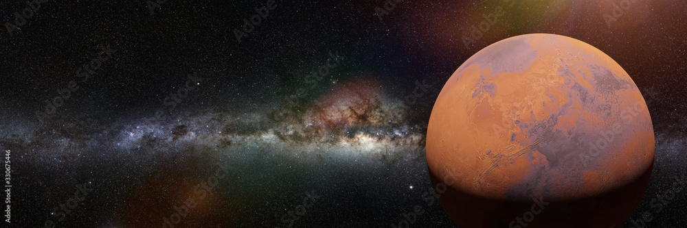 planet Mars, the red world in the solar system in front of he Milky Way galaxy