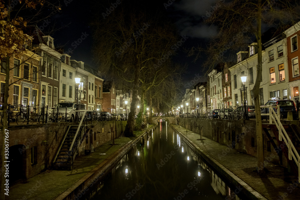Utrecht Nieuwegracht canal at night with illuminated canal houses