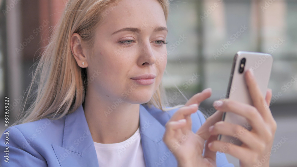 Young Businesswoman Using Smartphone Young Businesswoman Using Smartphone