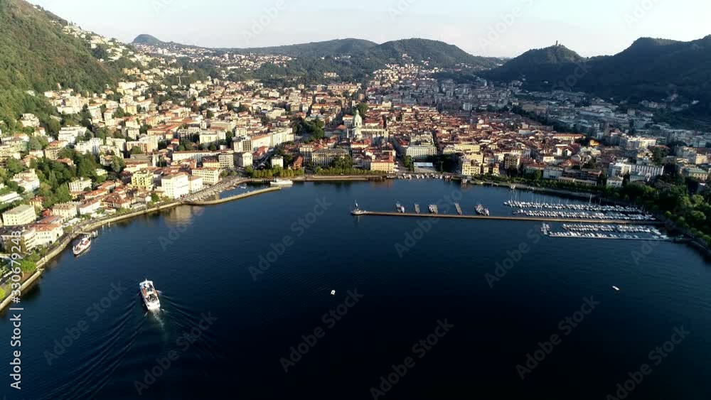 Static aerial helicopter view of Como is a city and comune in Lombardy Italy from which the proximity to Lake Como and to the Alps has made Como a popular tourist destination 4k high resolution Static aerial helicopter view of Como is a city and comune in Lombardy Italy from which the proximity to Lake Como and to the Alps has made Como a popular tourist destination 4k high resolution