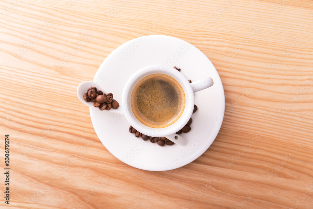 Obraz premium Espresso cup on a wooden table
