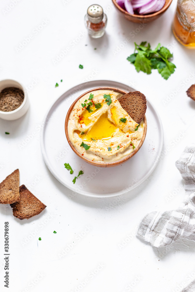Chickpeas hummus with toasted bread, olive oil and paprika Chickpeas hummus with toasted bread, olive oil and paprika