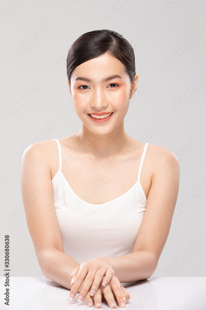 Beautiful Asian woman looking at camera smile with clean and fresh skin Happiness and cheerful with positive emotional,isolated on white background,Beauty Cosmetics and spa Facial treatment Concept Beautiful Asian woman looking at camera smile with clean and fresh skin Happiness and cheerful with positive emotional,isolated on white background,Beauty Cosmetics and spa Facial treatment Concept