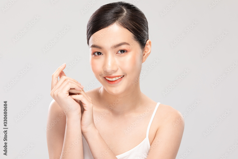 Beautiful Young Asian Woman Holding Hands smile feeling so happy and cheerful with healthy Clean and Fresh skin,isolated on white background,Beauty Cosmetics Concept Beautiful Young Asian Woman Holding Hands smile feeling so happy and cheerful with healthy Clean and Fresh skin,isolated on white background,Beauty Cosmetics Concept