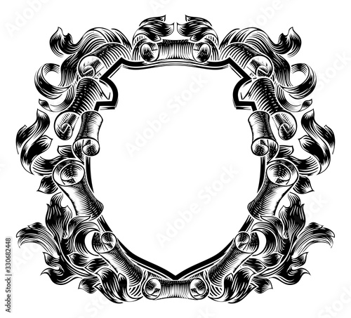 A coat of arms crest scroll and leaves vintage medieval style family heraldic shield decorative background frame.