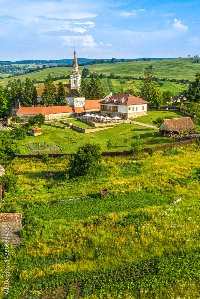 Summer in Haferland Fortified Saxon Church in Crit (Deutsch Kreuz) traditional Saxon village in Brasov county, Romania