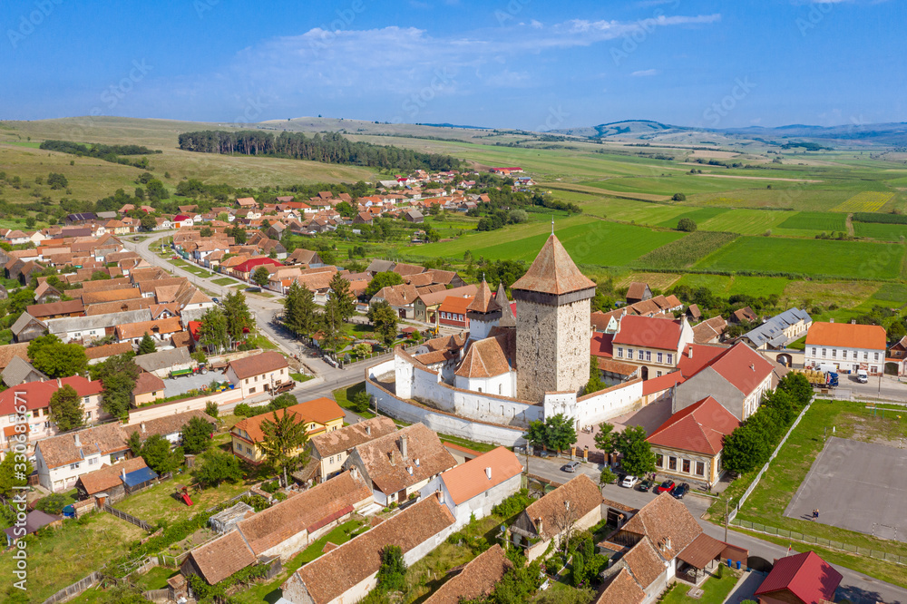 Obraz premium UNESCO world heritage fortified saxon church in Homorod Village, Transylvania