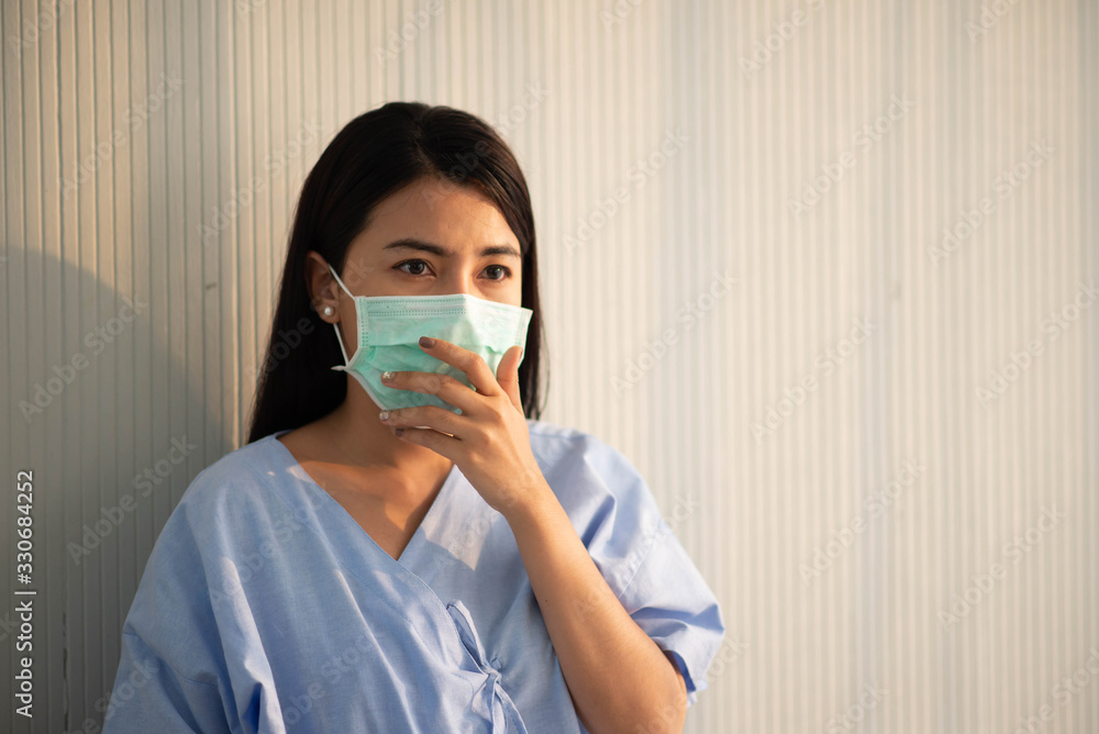 Asian patient woman wearing mask protect virus from sickness in hospital Asian patient woman wearing mask protect virus from sickness in hospital