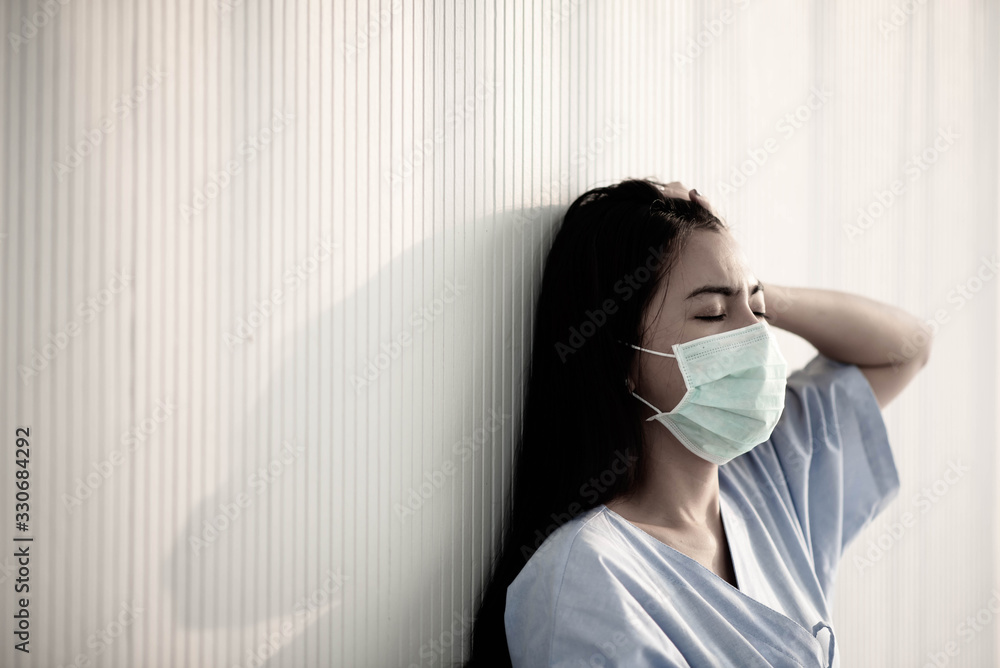 Asian patient woman wearing mask protect virus from sickness in hospital