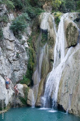 Lake and Polylimnio Waterfalls in Peloponnese, Greece photo