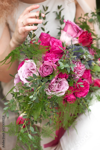 wedding purple boho bouquet in bride's hands