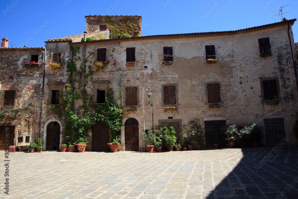 Montemerano (GR), Italy - September 11, 2017: A typical house and square in Montemerano village, Manciano, Grosseto, Tuscany, Italy, Europe