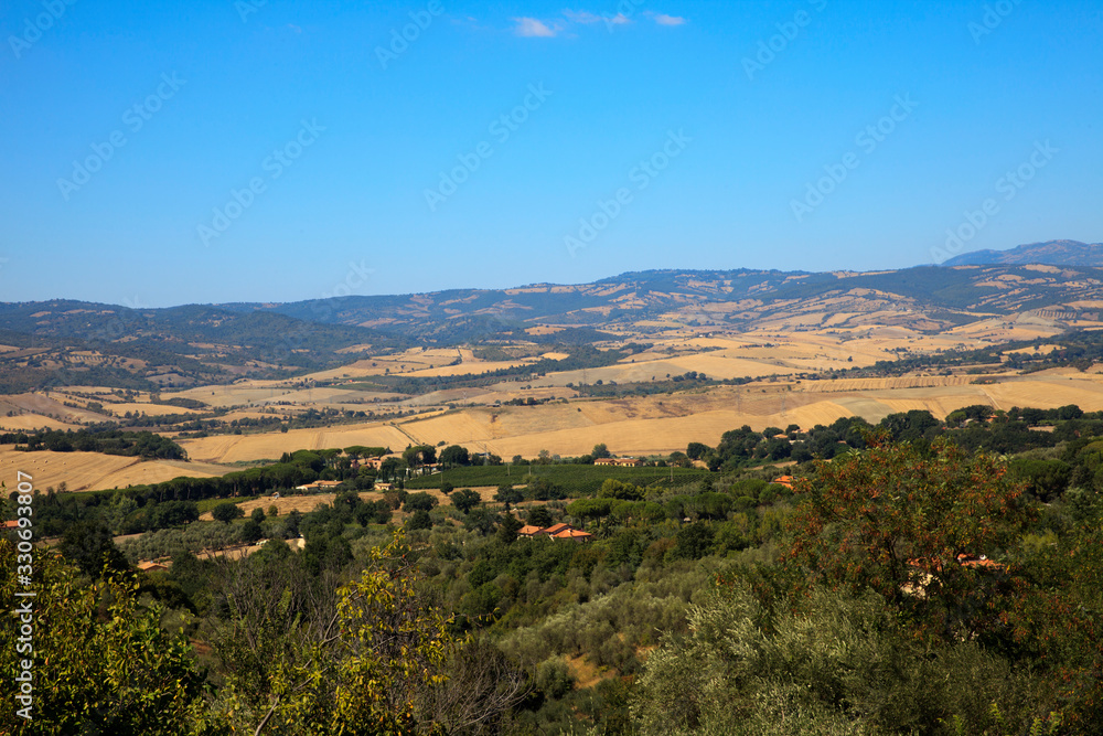 Montemerano (GR), Italy - September 11, 2017: Hills landscape and country around Montemerano village, Manciano, Grosseto, Tuscany, Italy, Europe