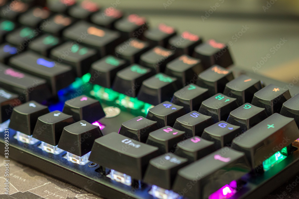 Photo of isolated dusty mechanical computer keyboard.