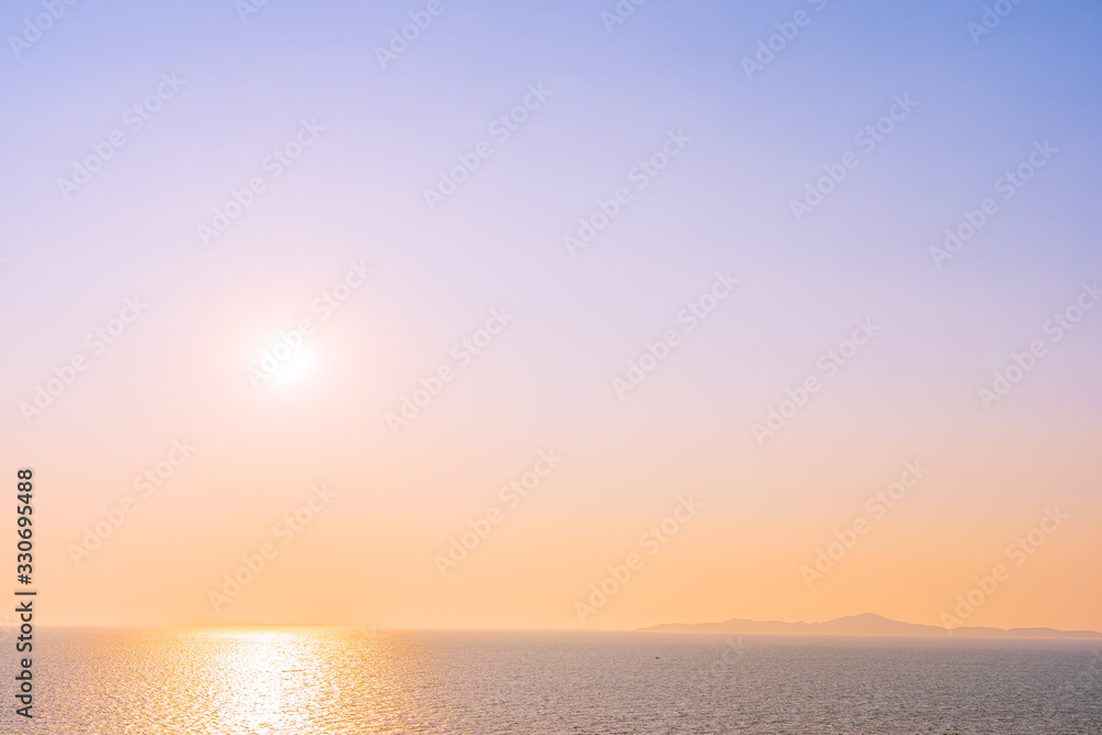 Beautiful sunset or sunrise around sea ocean bay with cloud on sky