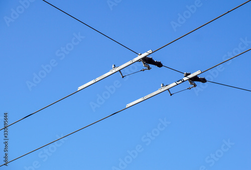 Electric streetcar wires overhead Trolley, Trams. Blue sky