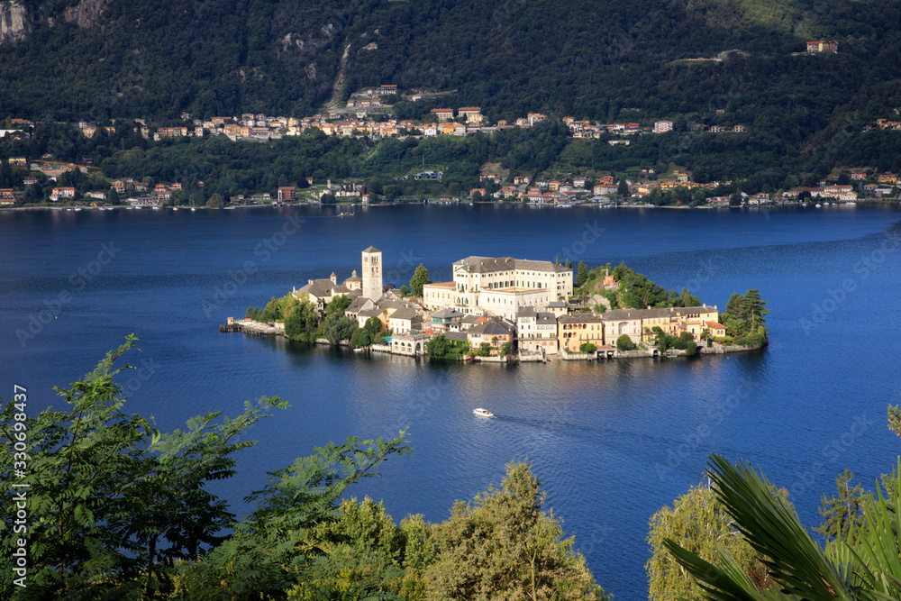 Orta San Giulio (NO), Italy - September 02, 2019: Landscape of San Giulio Island on Lake Orta, Novara, Piedmont, Italy
