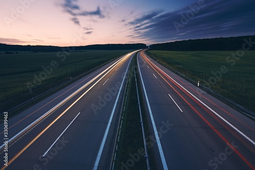 Light trails of cars on highway