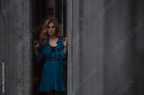 Beautiful woman with blonde long hair and blue eyes wanders the streets of Istanbul and poses for the camera © denizbayram