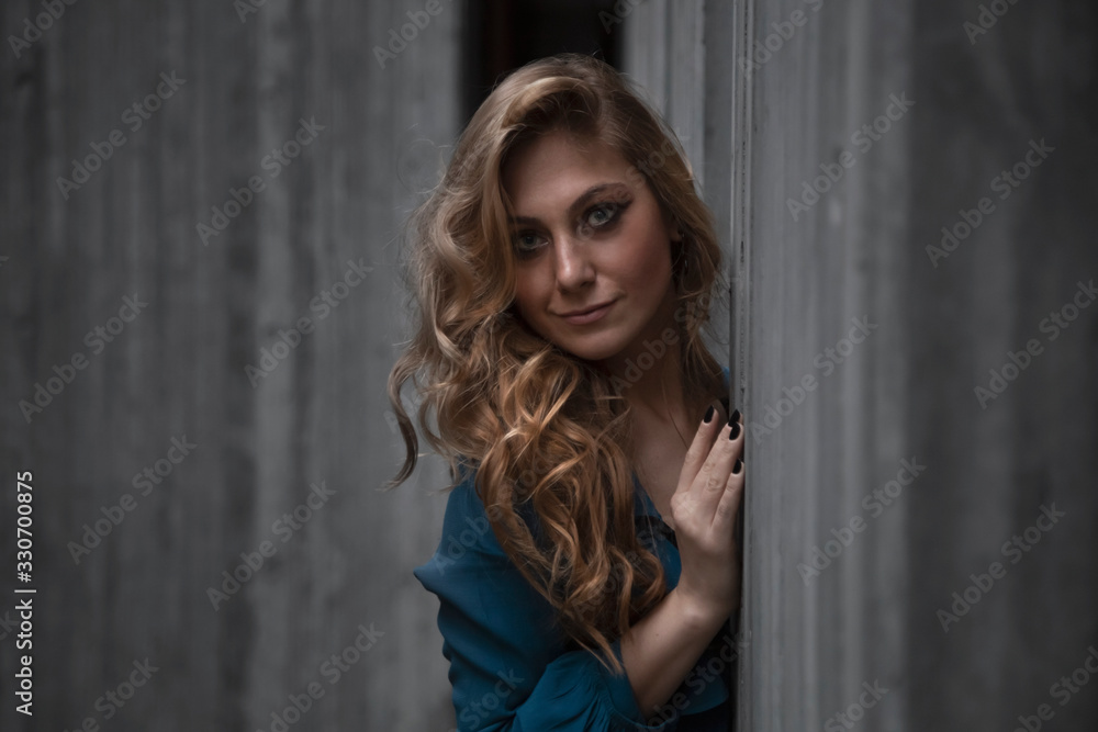 Beautiful woman with blonde long hair and blue eyes wanders the streets of Istanbul and poses for the camera Beautiful woman with blonde long hair and blue eyes wanders the streets of Istanbul and poses for the camera