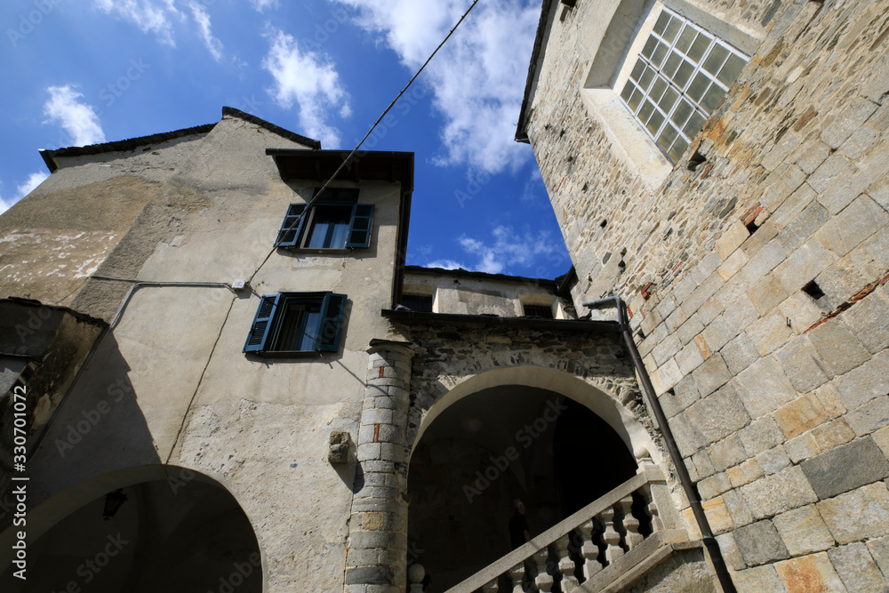 Fototapeta premium Orta San Giulio (NO), Italy - September 02, 2019: Houses detail in Orta San Giulio island, Orta, Novara, Piedmont, Italy