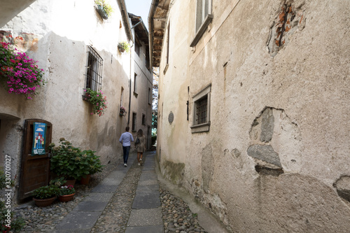 Orta San Giulio (NO), Italy - September 02, 2019: A typical small road in Orta San Giulio island, Orta, Novara, Piedmont, Italy