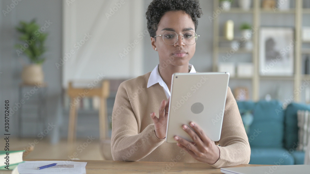 The Beautiful African Girl Using Tablet Computer The Beautiful African Girl Using Tablet Computer