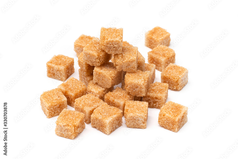 brown refined sugar on a white background brown refined sugar on a white background