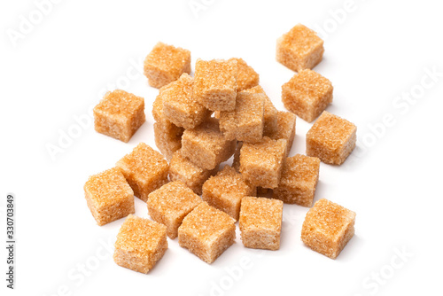 brown refined sugar on a white background