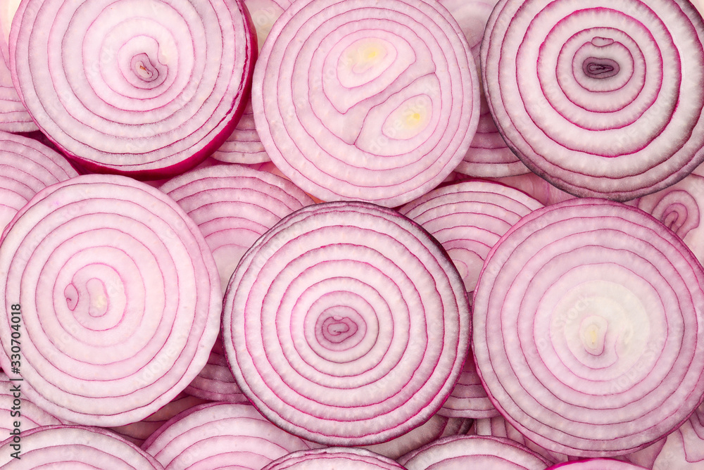 Onion slices as a background. Top view. Onion slices as a background. Top view.