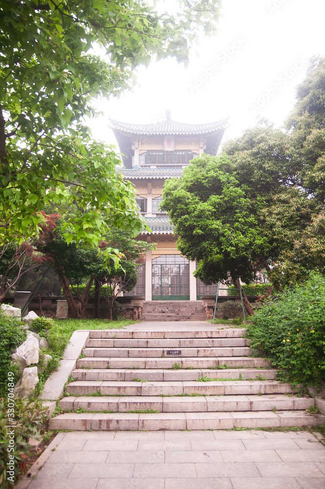Wuhan, China - April 24, 2019: Ting Tao Scenic Area in Wuhan East Lake Sakura Garden,Wuhan,China. Wuhan, China - April 24, 2019: Ting Tao Scenic Area in Wuhan East Lake Sakura Garden,Wuhan,China.